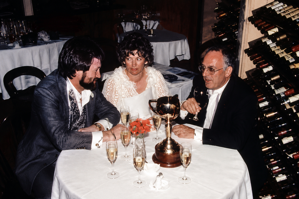 Dennis Gowing and Derryn Hinch celebrating What A Nuisance's 1985 Melbourne Cup victory at Gowings Restaurant in Melbourne.